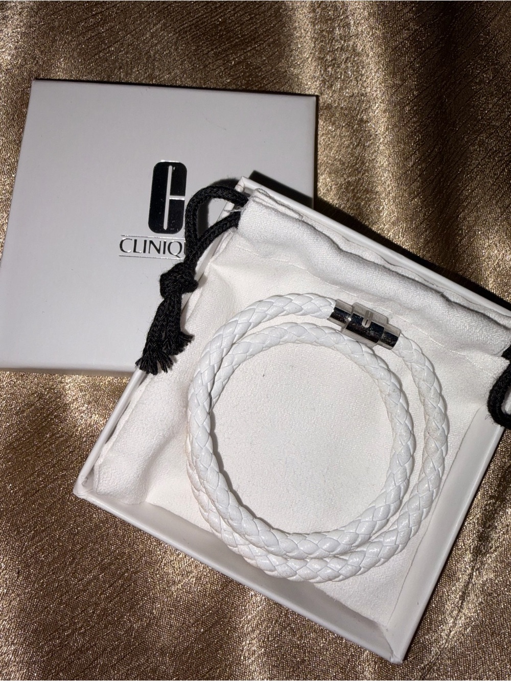 Clinique White leather Braided Wrap Bracelet